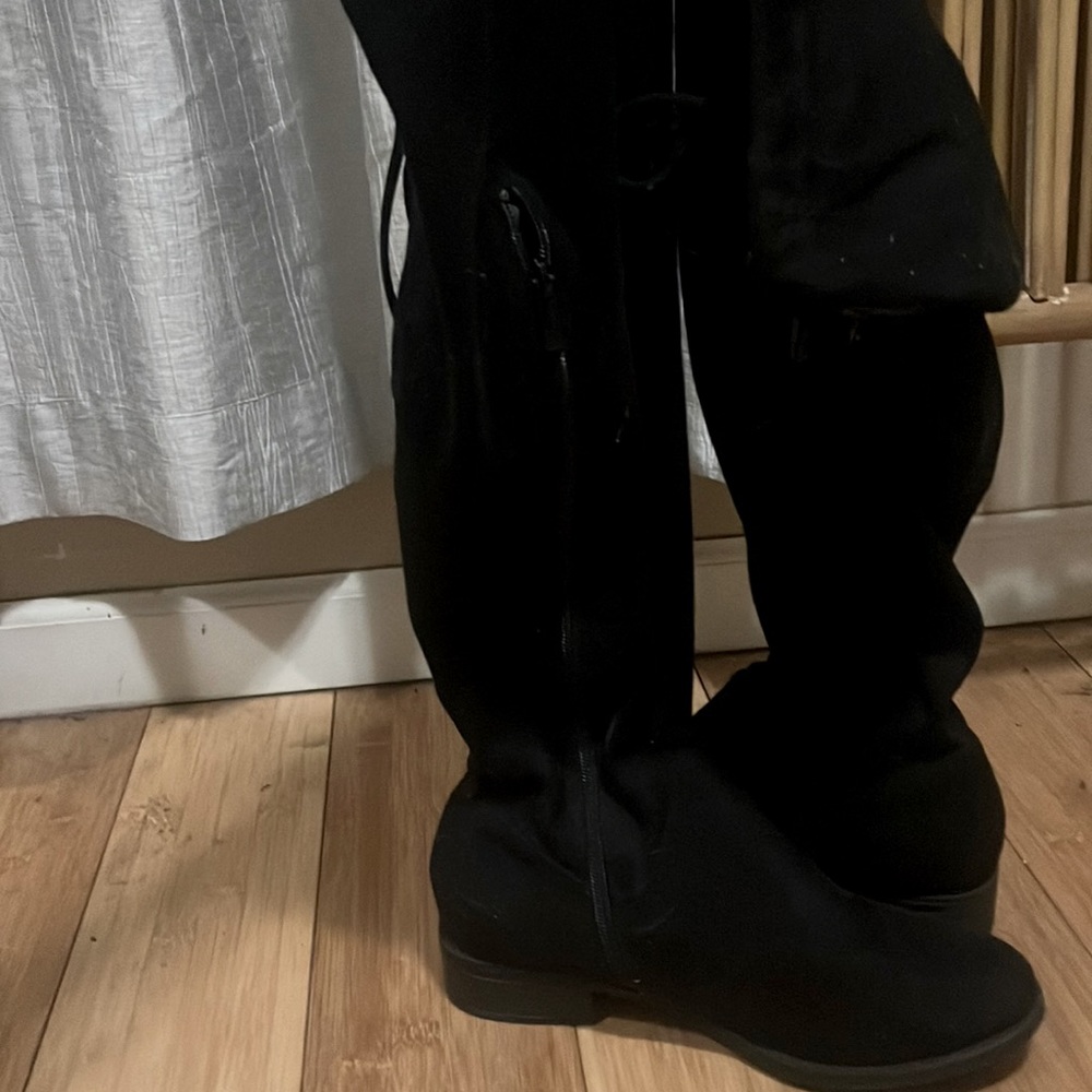 Black thigh high boots size 10 wore them once this winter I wear a size 9